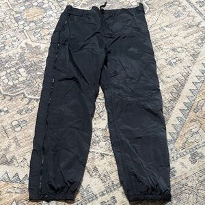 REI full leg zip lined wind pant. Size L